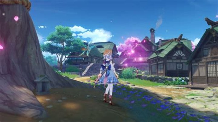 Ayaka standing in front of a Fravashi Tree in the Girdle of Sands, Genshin Impact&rsquo;s new desert region in Sumeru.