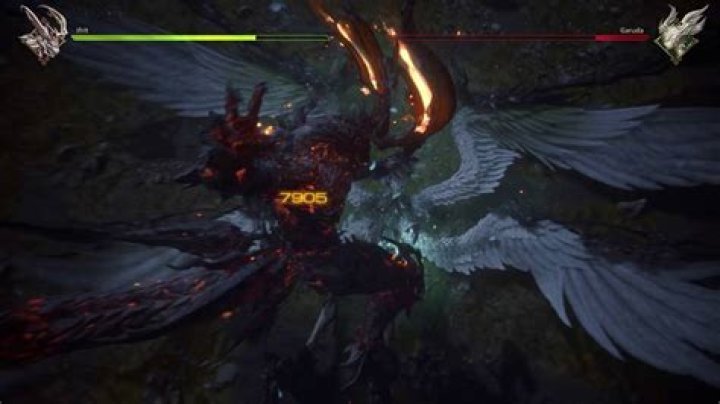 Ifrit slashes at a downed Garuda in an Eikon Clash battle in Final Fantasy 16
