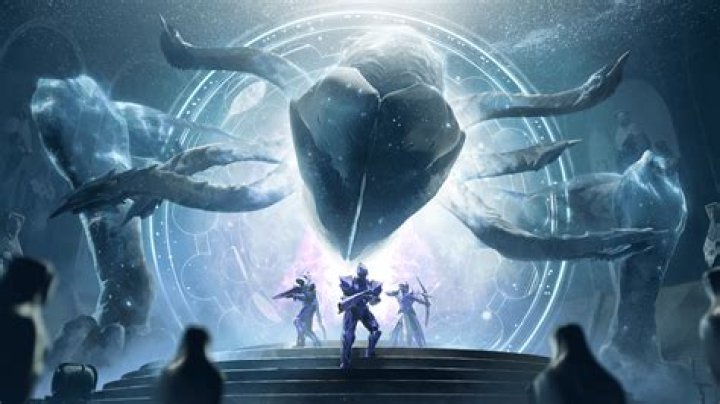 Three Guardians stand in the Tower in their Bungie 30th Anniversary gear